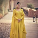 Yellow Elegant Chikankari Embroidered Flared Dress by Zedanya
